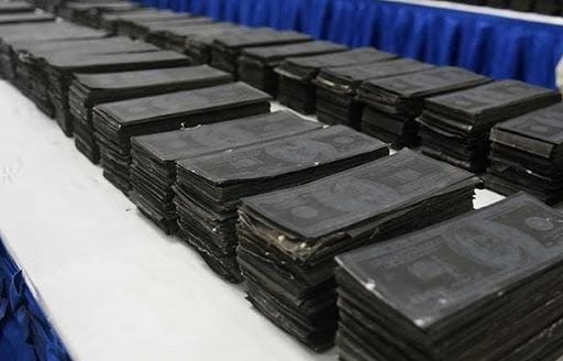 TOUT SUR LE FAUX MONNAYAGE DE BILLETS NOIRES D'UNE CONTREVALEUR DE 905 MILLIONS  :Un Ivoirien, cerveau du réseau, activement recherché